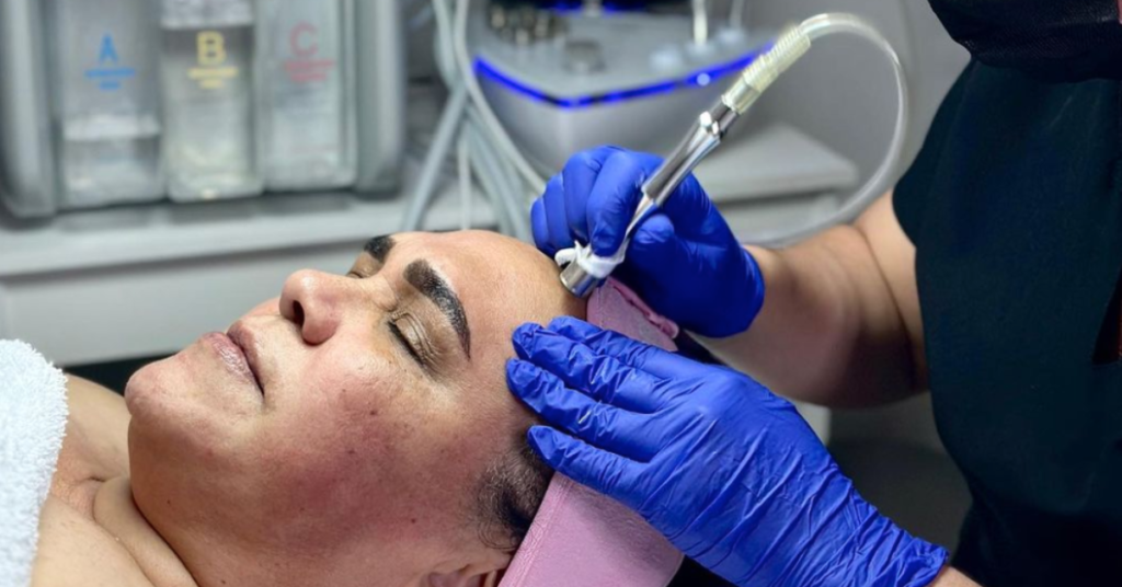 old woman getting microdermabrasion treatment