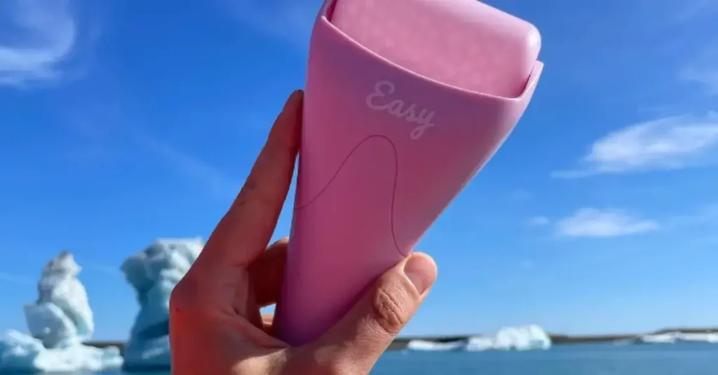 pink ice roller with water in the background