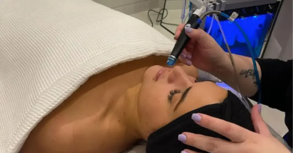 young woman getting hydrafacial treatment