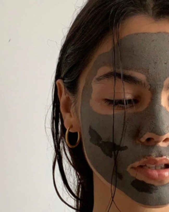young brown haired woman with face mask