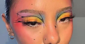 young asian woman with rave makeup