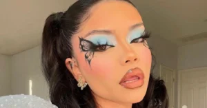 young woman with butterfly makeup